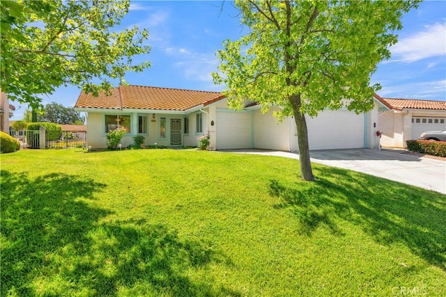 904 Torrey Pines Dr, Paso Robles, CA 93446 - mediterranean / spanish-style house with an attached garage, concrete driveway, a tile roof, and stucco siding
