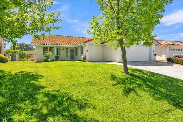 904 Torrey Pines Dr, Paso Robles, CA 93446 - mediterranean / spanish-style house featuring an attached garage, driveway, a tile roof, and stucco siding