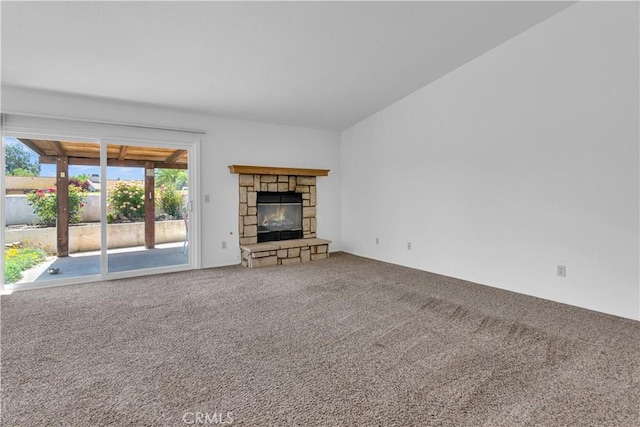 904 Torrey Pines Dr, Paso Robles, CA 93446 - unfurnished living room featuring carpet and a stone fireplace