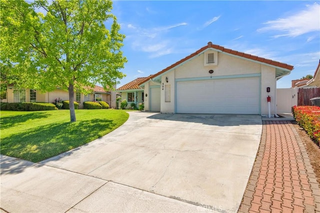 904 Torrey Pines Dr, Paso Robles, CA 93446 - view of front of home with concrete driveway, stucco siding, a garage, and a tile roof