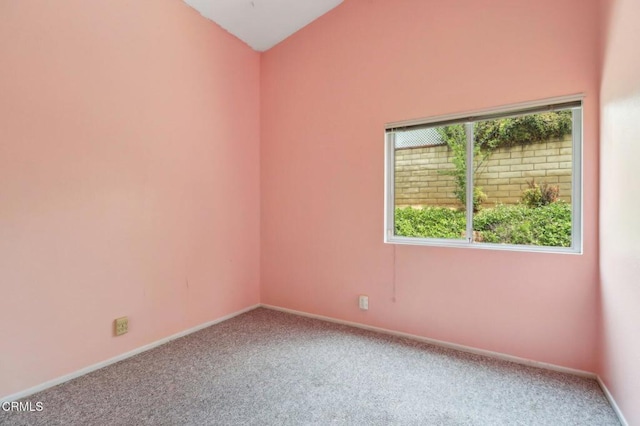 22573 Honnold Dr, Santa Clarita, CA 91350 - carpeted spare room with lofted ceiling and baseboards