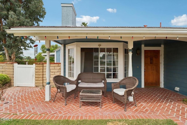 22573 Honnold Dr, Santa Clarita, CA 91350 - view of patio with fence and an outdoor living space