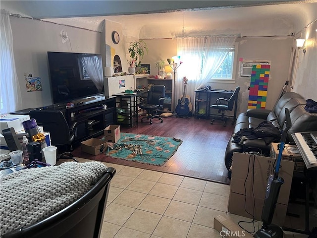 702 N Burris Ave, Compton, CA 90221 - living room featuring tile patterned floors and a wall mounted AC
