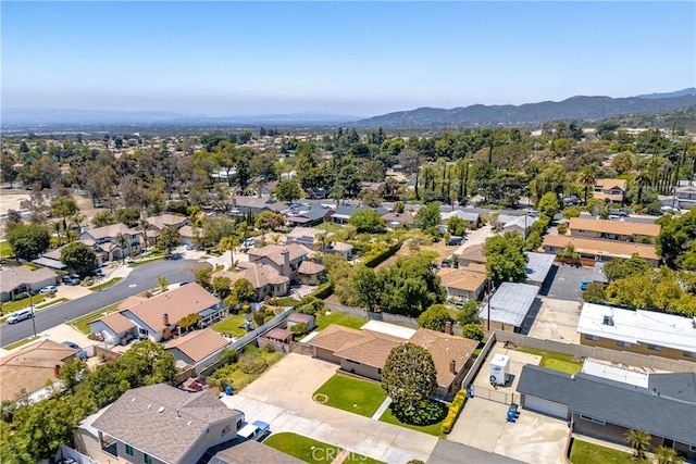 aerial perspective of suburban area with a mountain backdrop