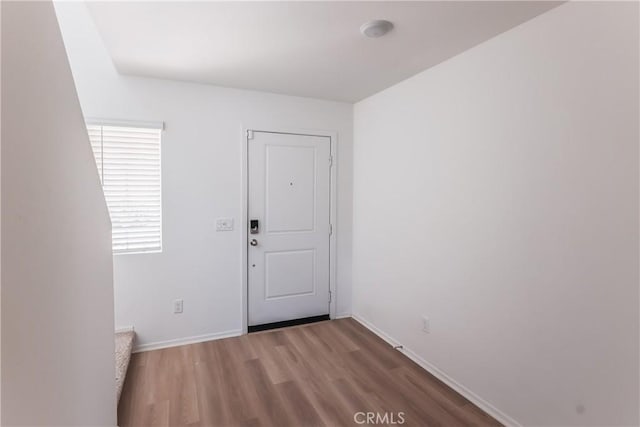 959 Rockcress Ln, Banning, CA 92220 - spare room featuring wood finished floors and baseboards