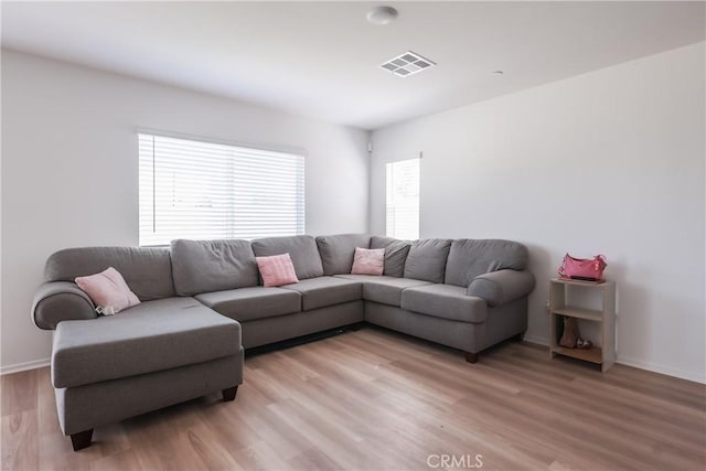 959 Rockcress Ln, Banning, CA 92220 - living area featuring light wood-type flooring and baseboards