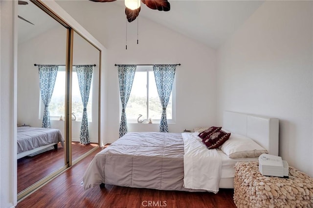 25552 Paseo La Vis Unit 20, Laguna Niguel, CA 92677 - bedroom featuring vaulted ceiling, dark wood-style flooring, a ceiling fan, and a closet