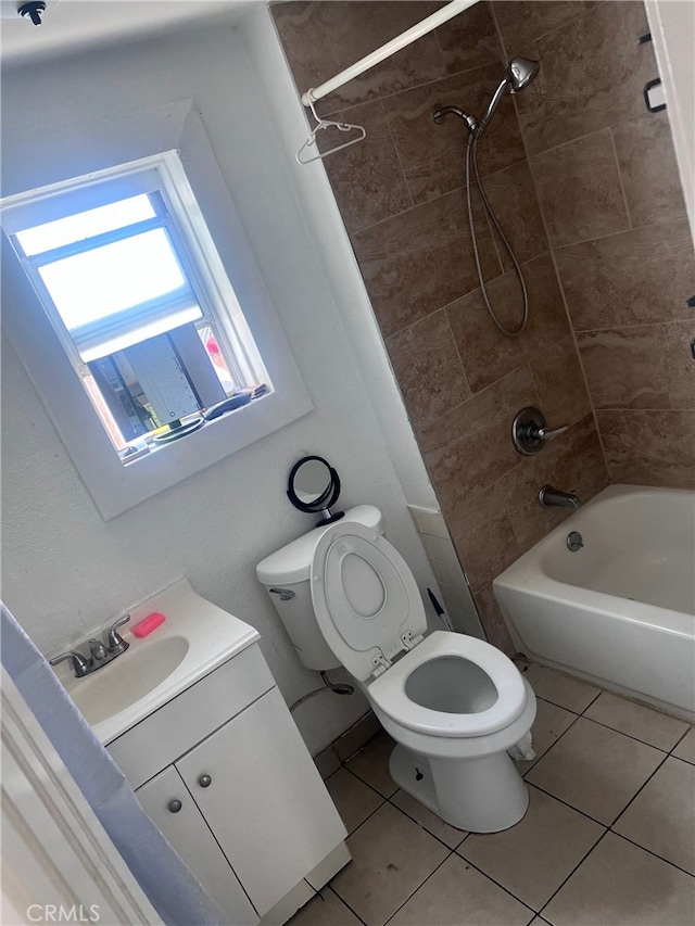2112 E Lucien St, Compton, CA 90222 - bathroom featuring toilet, tile patterned floors,  shower combination, and vanity
