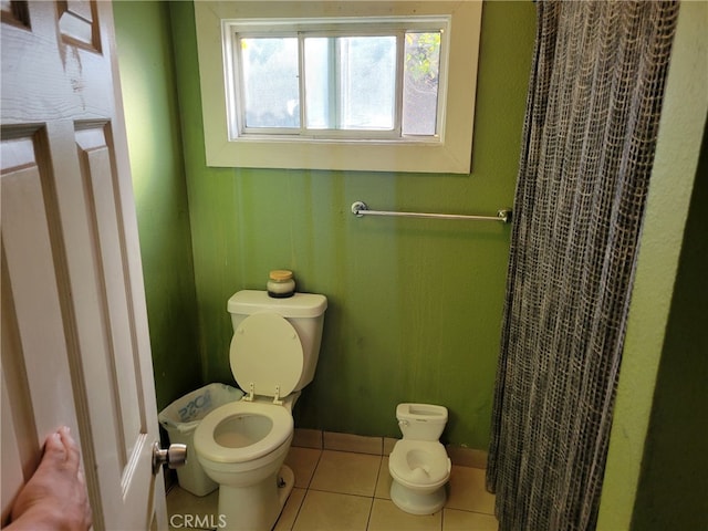 2112 E Lucien St, Compton, CA 90222 - full bathroom with toilet, tile patterned floors, and a shower with shower curtain