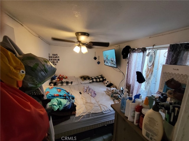 2112 E Lucien St, Compton, CA 90222 - tiled bedroom with a ceiling fan