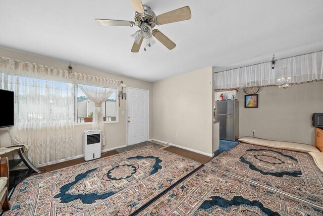908 S Sunshine Ave Unit 18, El Cajon, CA 92020 - bedroom with freestanding refrigerator, baseboards, and ceiling fan