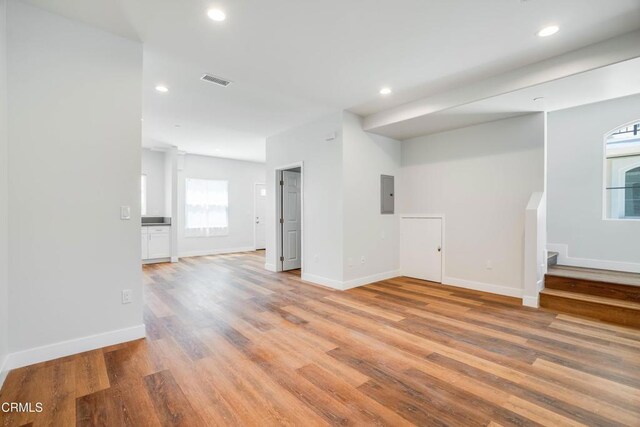 300 E Alhambra Rd Unit D, Alhambra, CA 91801 - unfurnished room with light wood-type flooring, electric panel, and recessed lighting