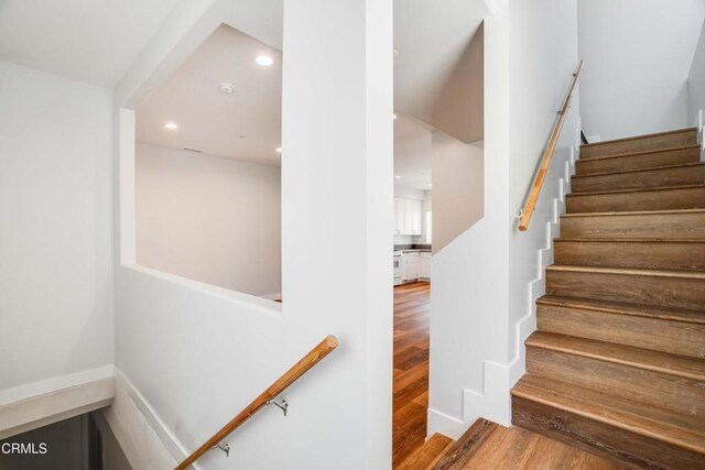 300 E Alhambra Rd Unit D, Alhambra, CA 91801 - staircase featuring wood finished floors and recessed lighting