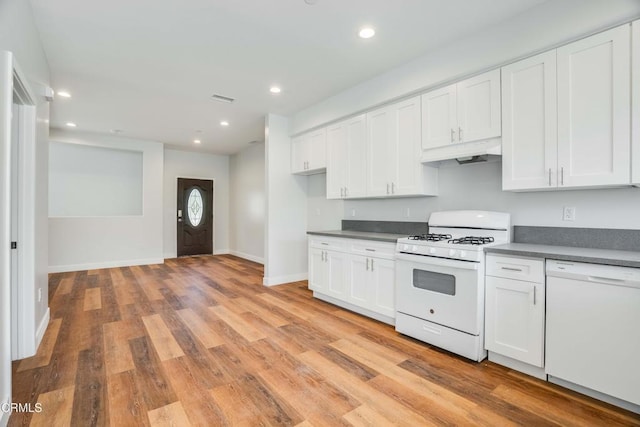 300 E Alhambra Rd Unit D, Alhambra, CA 91801 - kitchen with white appliances, under cabinet range hood, light wood-type flooring, white cabinetry, and recessed lighting