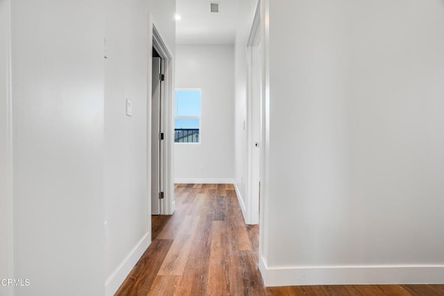 300 E Alhambra Rd Unit D, Alhambra, CA 91801 - corridor with baseboards and wood finished floors