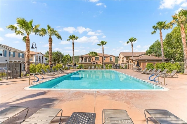 28116 Calle Lumina, Temecula, CA 92592 - community pool with a residential view, a patio, and fence