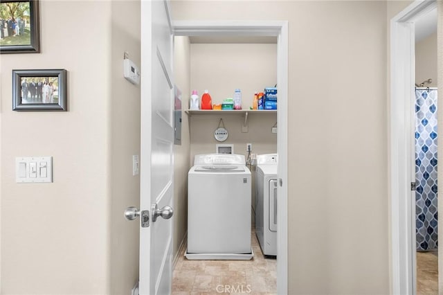 28116 Calle Lumina, Temecula, CA 92592 - laundry area with washing machine and dryer and baseboards