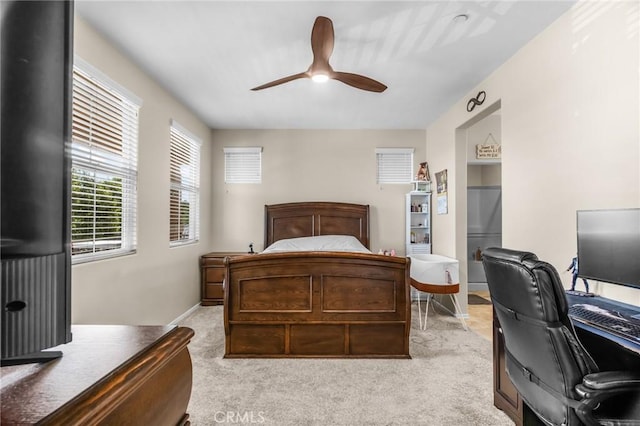 28116 Calle Lumina, Temecula, CA 92592 - bedroom with an office area, light colored carpet, ceiling fan, and baseboards