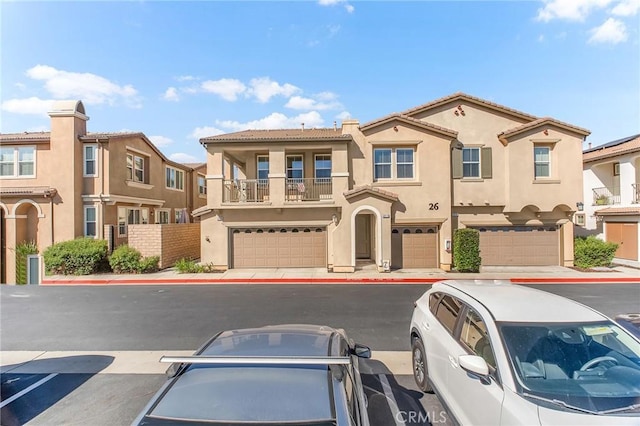 28116 Calle Lumina, Temecula, CA 92592 - townhome / multi-family property with stucco siding, a balcony, uncovered parking, a garage, and a tile roof
