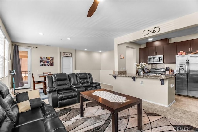 28116 Calle Lumina, Temecula, CA 92592 - living area featuring ceiling fan, light carpet, and recessed lighting