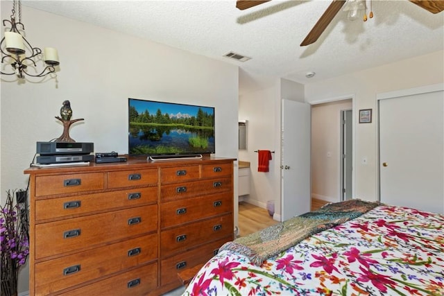 7030 Idyllwild Ln, Riverside, CA 92503 - bedroom featuring a textured ceiling