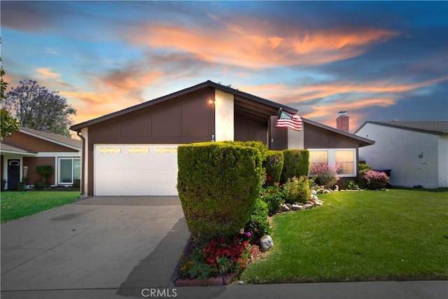 7030 Idyllwild Ln, Riverside, CA 92503 - view of front of property featuring concrete driveway, a front lawn, a garage, and a chimney