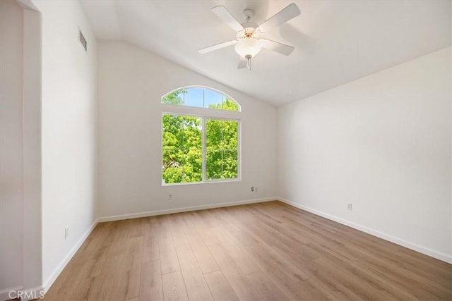 2923 Cottage Ln, Paso Robles, CA 93446 - unfurnished room with wood finished floors, vaulted ceiling, baseboards, and a ceiling fan