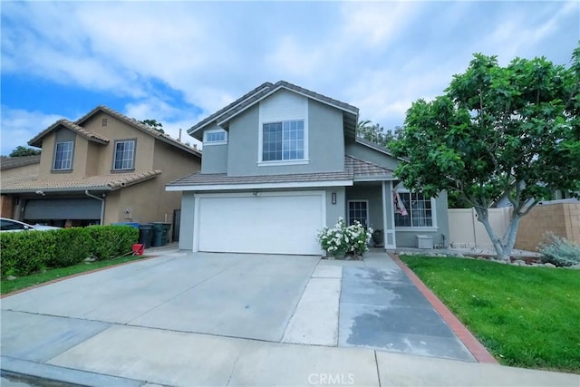 1778 Rockview Way, Pomona, CA 91766 - traditional home with a garage, stucco siding, and driveway