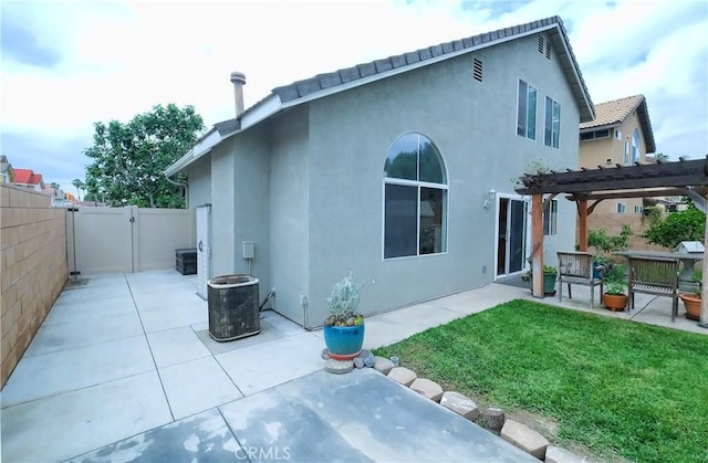 1778 Rockview Way, Pomona, CA 91766 - back of property featuring a pergola, stucco siding, a gate, a patio, and central air condition unit