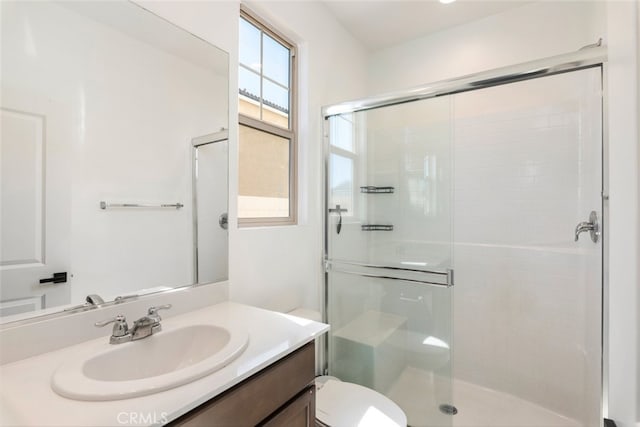 25367 Circle Stone Dr, Menifee, CA 92586 - bathroom with a stall shower, vanity, and toilet