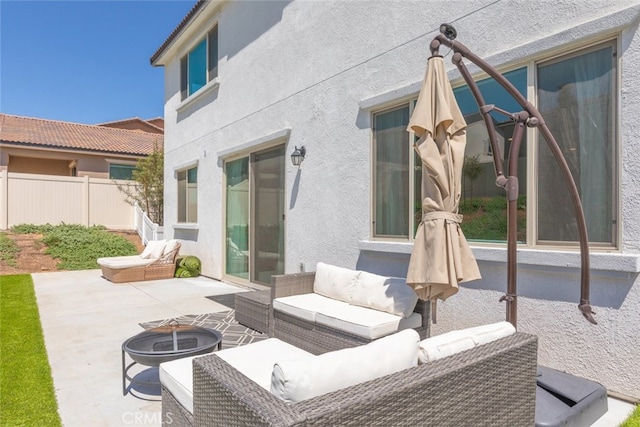 25367 Circle Stone Dr, Menifee, CA 92586 - view of patio / terrace with fence and an outdoor living space with a fire pit