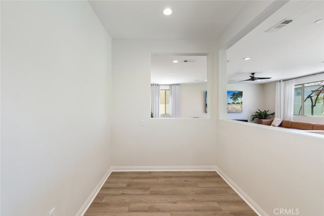 25367 Circle Stone Dr, Menifee, CA 92586 - hall with light wood finished floors, recessed lighting, and baseboards