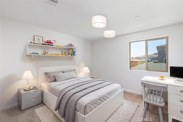 25367 Circle Stone Dr, Menifee, CA 92586 - bedroom with baseboards, an office area, and light wood-type flooring