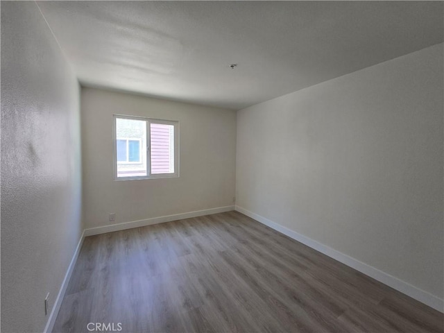 70 Harkness Ave Unit 4, Pasadena, CA 91106 - empty room with wood finished floors and baseboards
