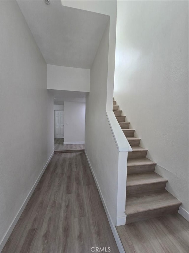 70 Harkness Ave Unit 4, Pasadena, CA 91106 - stairway with wood finished floors and baseboards