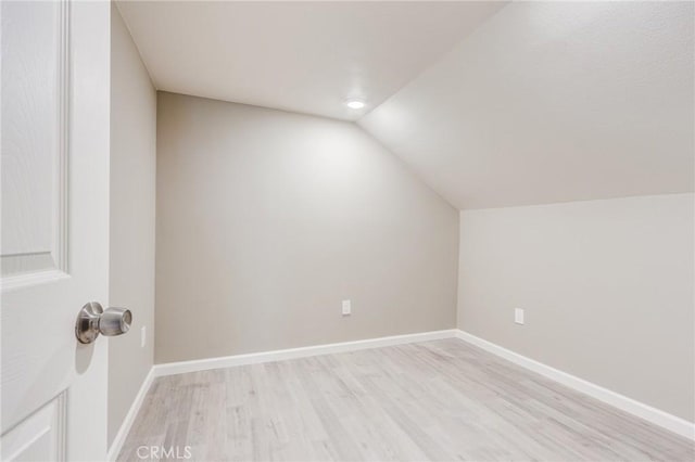 33350 Robin Dr, Green Valley Lake, CA 92341 - bonus room featuring light wood finished floors, vaulted ceiling, and baseboards