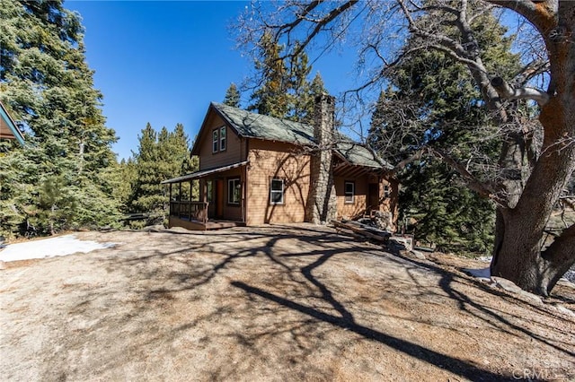 33350 Robin Dr, Green Valley Lake, CA 92341 - view of property exterior featuring a chimney