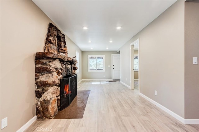 33350 Robin Dr, Green Valley Lake, CA 92341 - living room featuring light wood-style flooring, a fireplace, baseboards, and recessed lighting