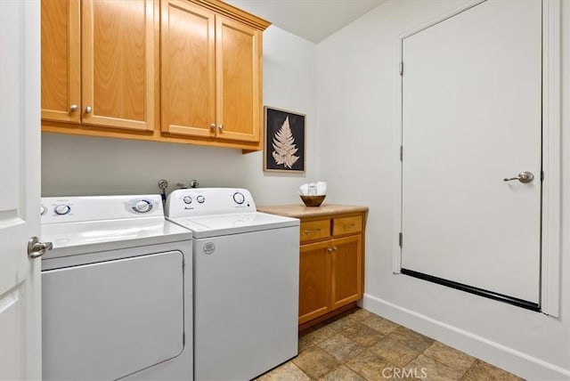 511 3rd St, Paso Robles, CA 93446 - washroom with washing machine and dryer, cabinet space, and baseboards