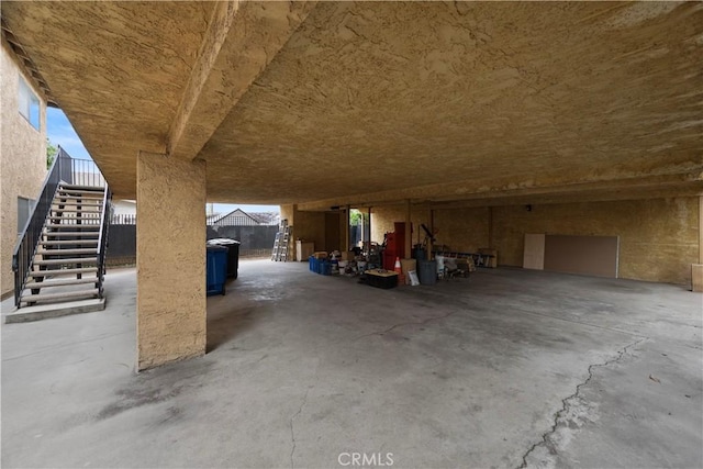 garage featuring fence