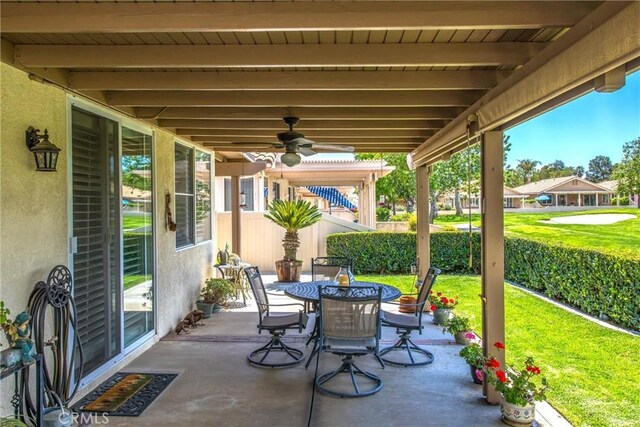 684 Big Spring Dr, Banning, CA 92220 - view of patio / terrace with a ceiling fan and outdoor dining area