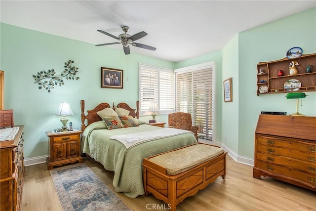684 Big Spring Dr, Banning, CA 92220 - bedroom featuring light wood finished floors, baseboards, ceiling fan, and access to outside