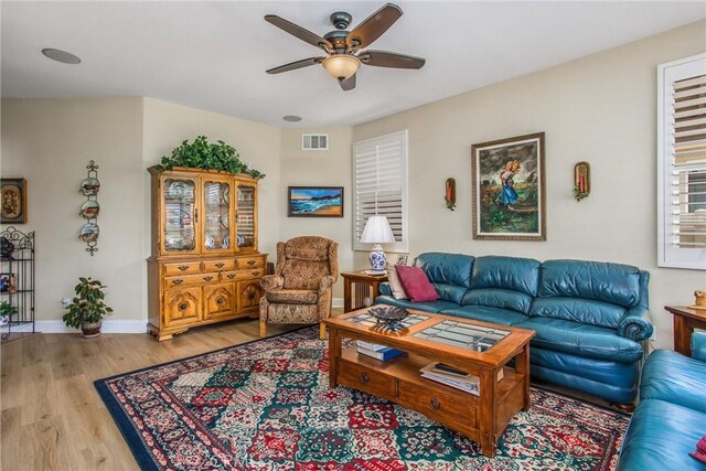 684 Big Spring Dr, Banning, CA 92220 - living room featuring a ceiling fan, light wood-style floors, and baseboards