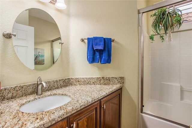 684 Big Spring Dr, Banning, CA 92220 - bathroom featuring vanity and a textured wall