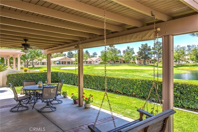 684 Big Spring Dr, Banning, CA 92220 - view of patio / terrace featuring outdoor dining area, a water view, a residential view, and a ceiling fan
