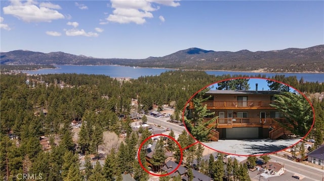 41764 Brownie Ln Unit 5, Big Bear Lake, CA 92315 - aerial view of property and surrounding area featuring a water and mountain view and a heavily wooded area