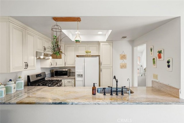 3040 La Paz Ln Unit B, Diamond Bar, CA 91765 - kitchen featuring stainless steel appliances, a sink, a peninsula, light stone counters, and recessed lighting