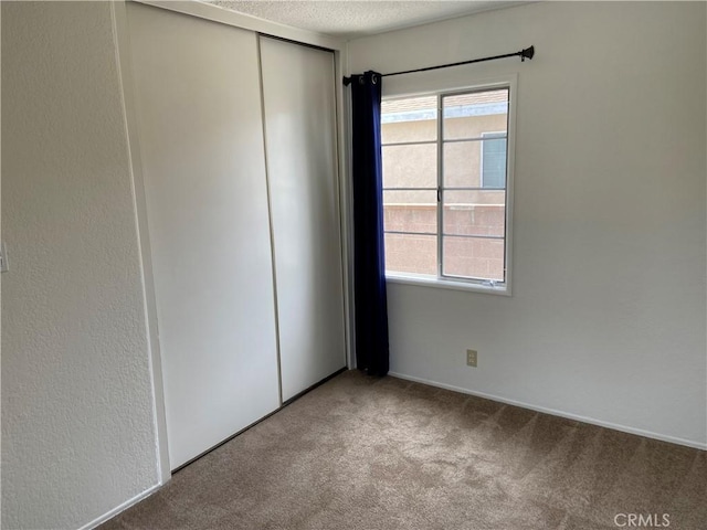 17628 Kornblum Ave, Torrance, CA 90504 - carpeted spare room featuring a textured ceiling and baseboards