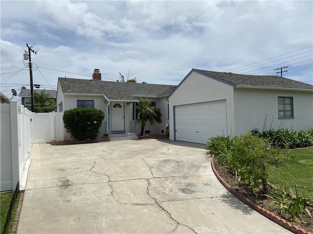 17628 Kornblum Ave, Torrance, CA 90504 - ranch-style home with concrete driveway, stucco siding, a garage, fence, and a chimney