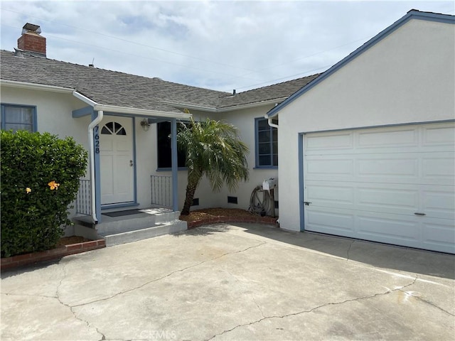 17628 Kornblum Ave, Torrance, CA 90504 - view of front of house featuring stucco siding, a garage, a shingled roof, and concrete driveway